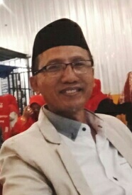 Drs. Husnul Karimi, M.M